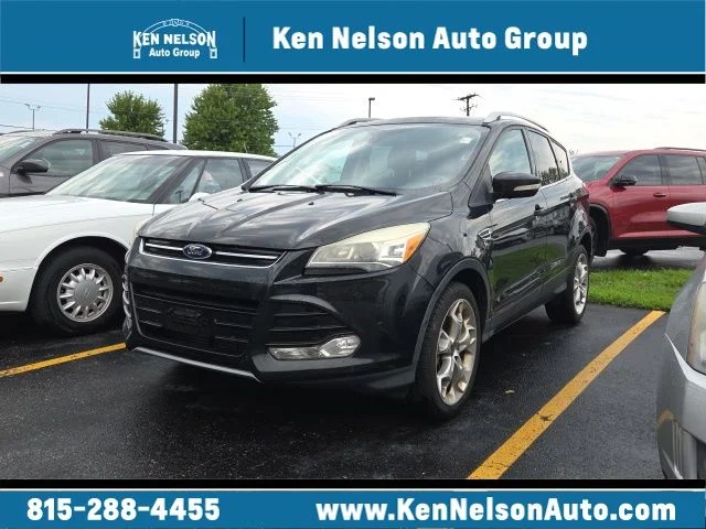 Used 2014 Black Ford Titanium image 1