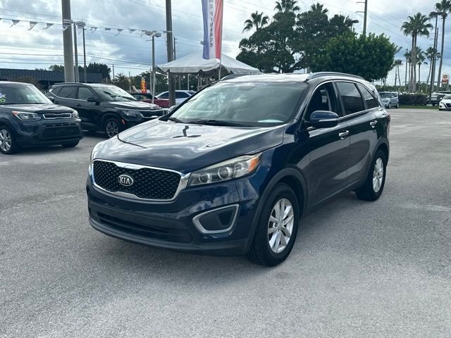 Used 2016 Kia Sorento LX with VIN 5XYPG4A39GG091414 for sale in Stuart, FL