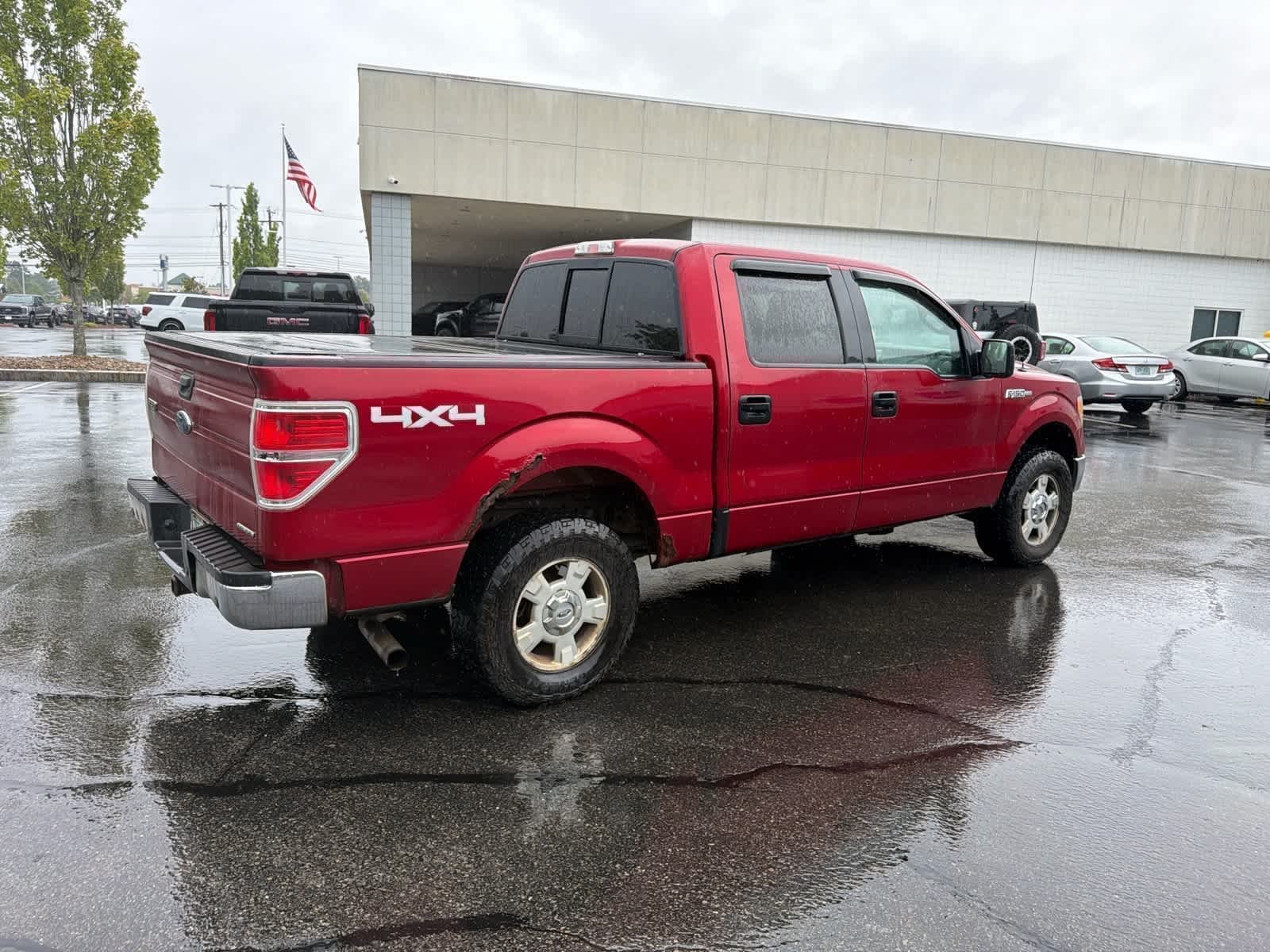 Used 2013 Ruby Red Tinted Clearcoat Metallic Ford XLT image 7