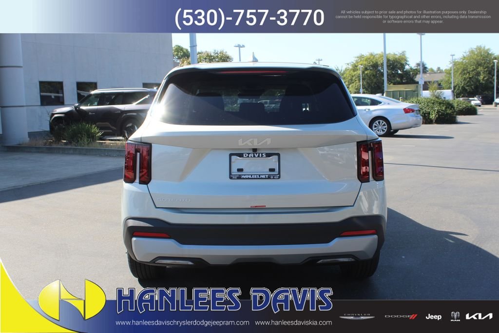New 2026 Ivory Silver Kia LX image 8