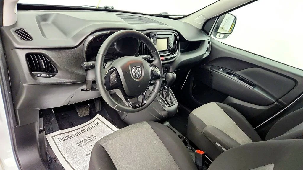 Used 2016 Bright White Ram 122