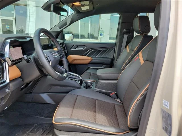 Used 2026 Tan GMC AT4 4x4 Crew Cab 5 ft. box 131 in. WB image 10