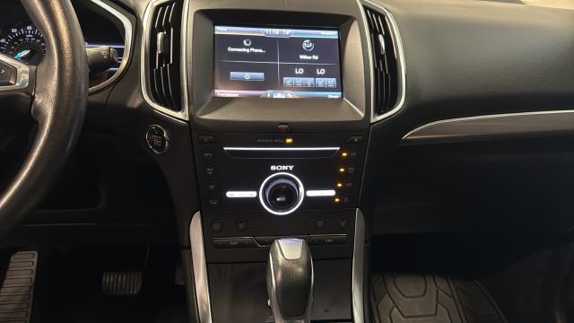 Used 2015 Magnetic Metallic Ford Titanium image 13