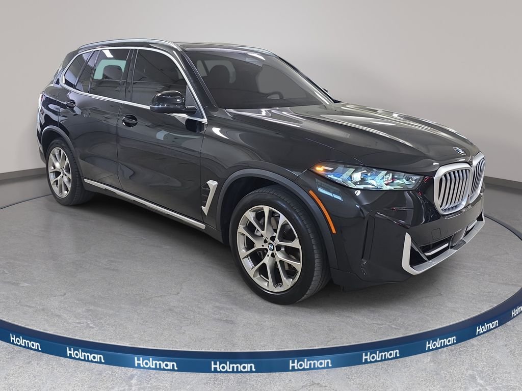 Certified Used 2024 Black Sapphire Metallic BMW xDrive40i image 3