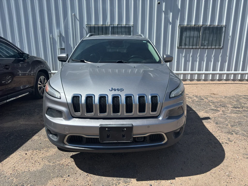 Used 2014 Billet Silver Metallic Clearcoat Jeep Limited image 1
