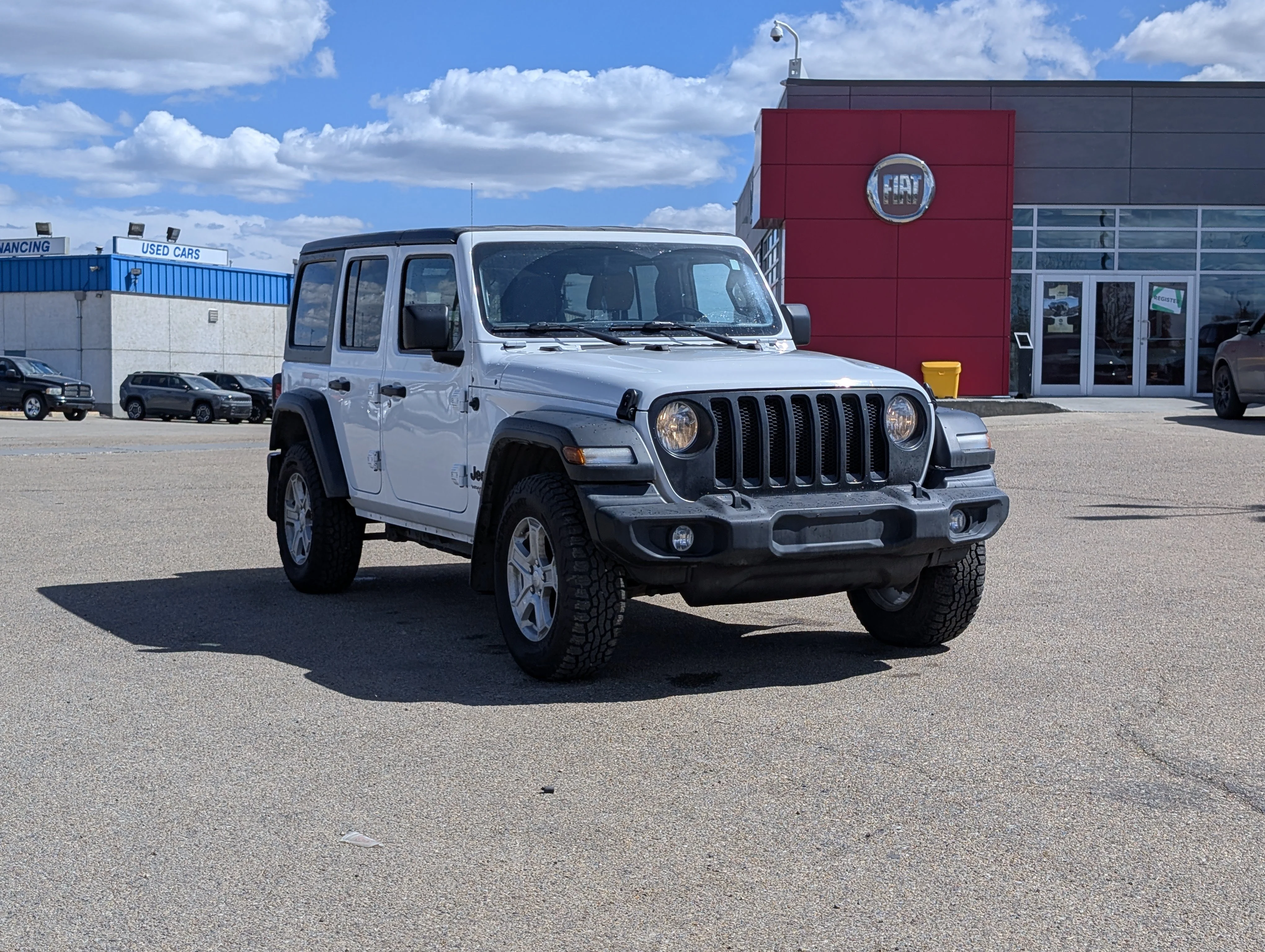 Used 2021 Bright White Jeep Unlimited Sport image 9