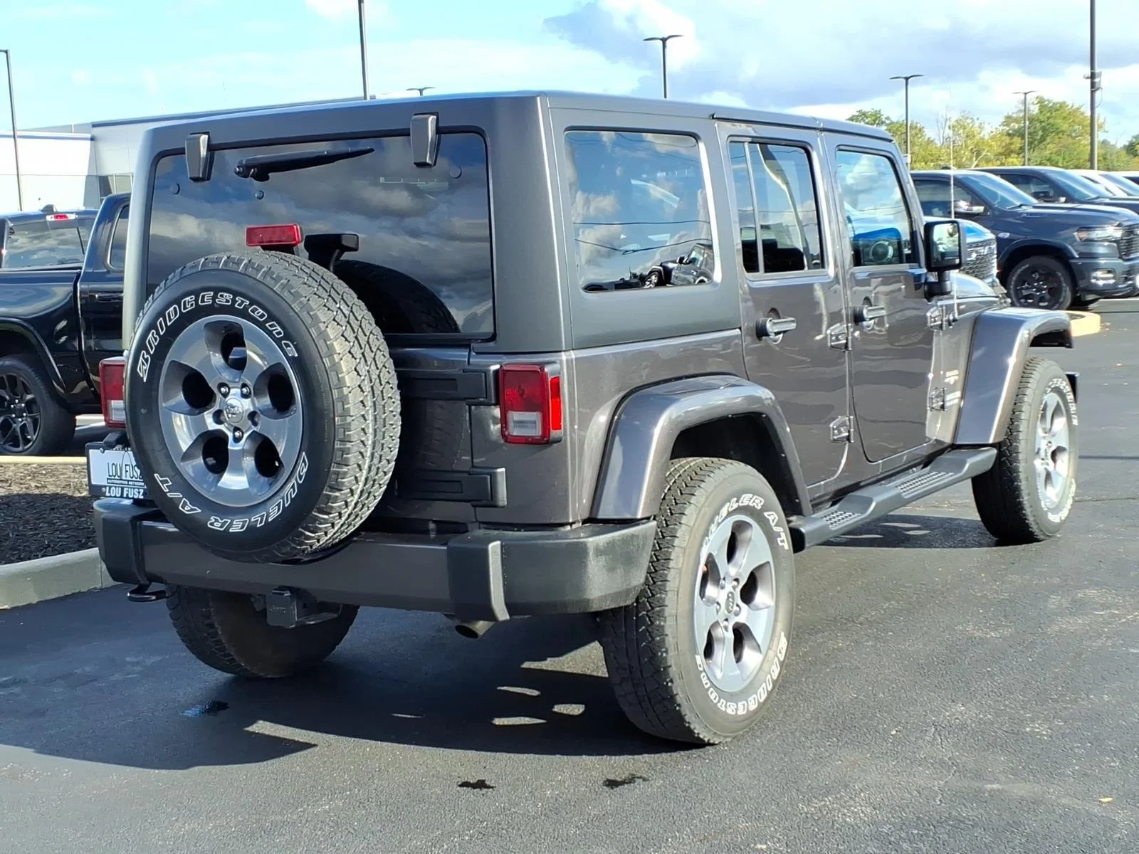 Used 2017 Granite Crystal Metallic Clearcoat Jeep Sahara image 24