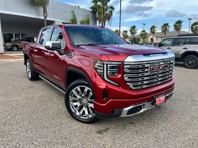 Used 2023 VOLCANIC RED TINTCOAT GMC Denali image 1
