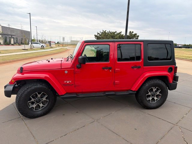 Used 2017 Red Jeep Unlimited Sahara image 2