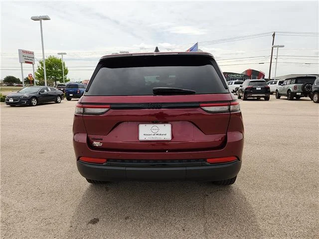 Used 2024 Velvet Red Pearlcoat Jeep Altitude 4x4 image 3