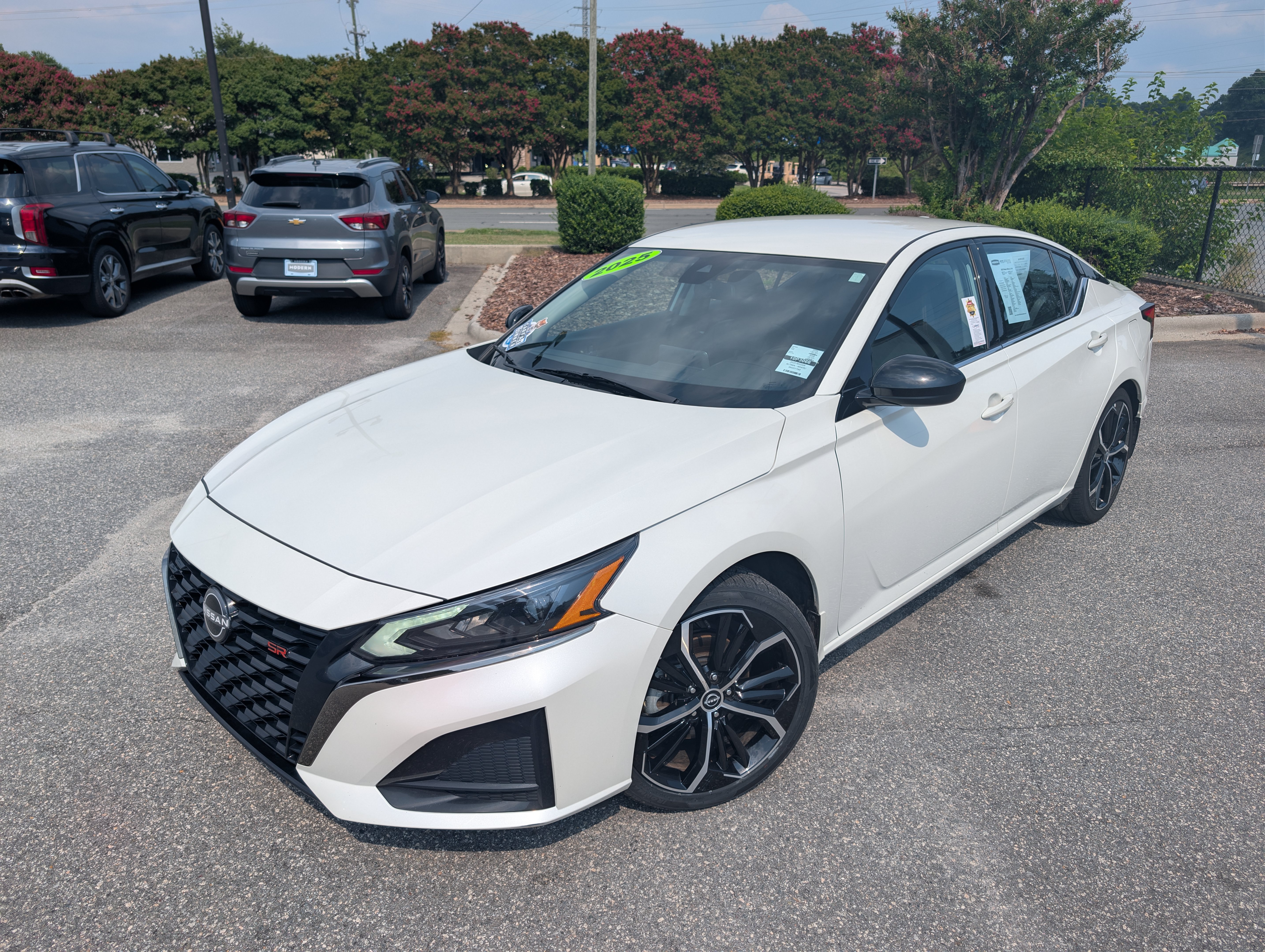 Used 2025 Pearl White Tricoat Nissan SR image 1