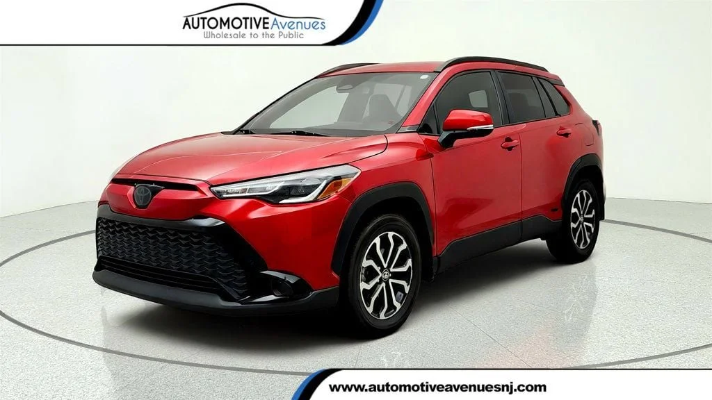 Used 2024 Barcelona Red Metallic Toyota Hybrid SE 4WD image 1