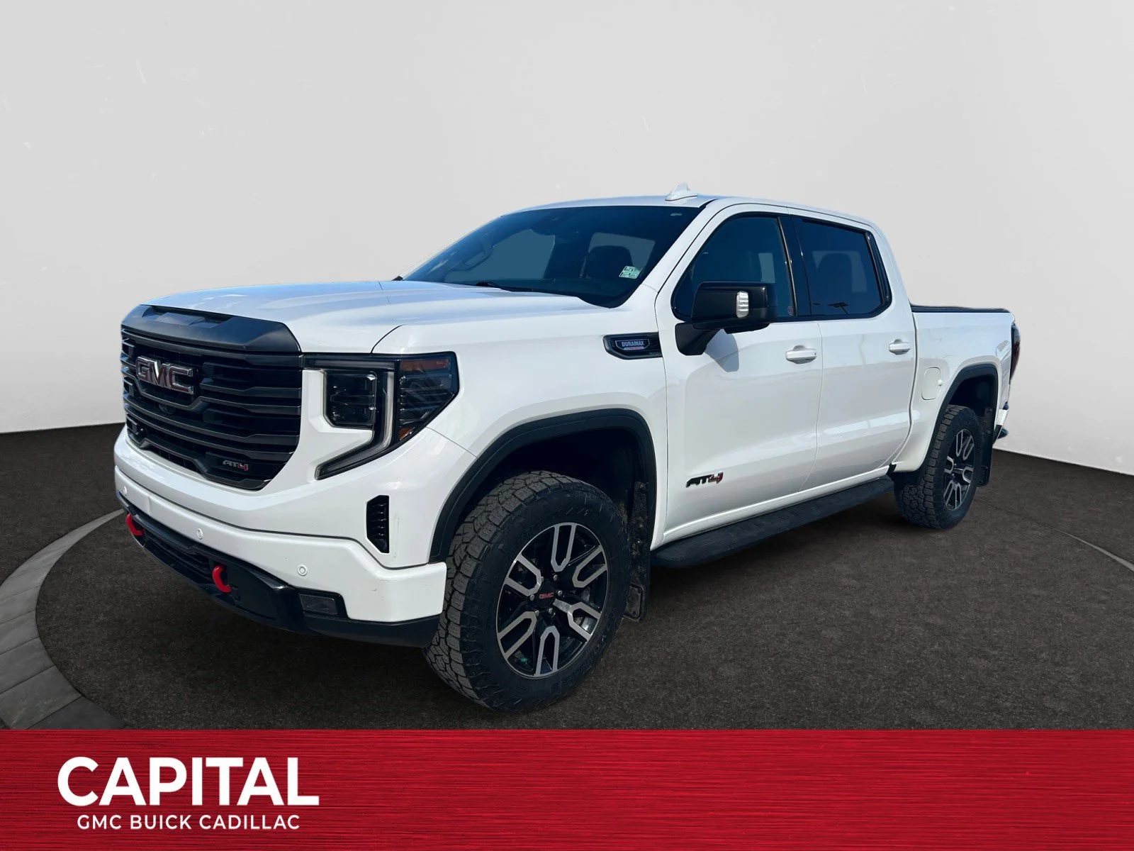 Used 2022 White GMC AT4 Crew Cab image 1
