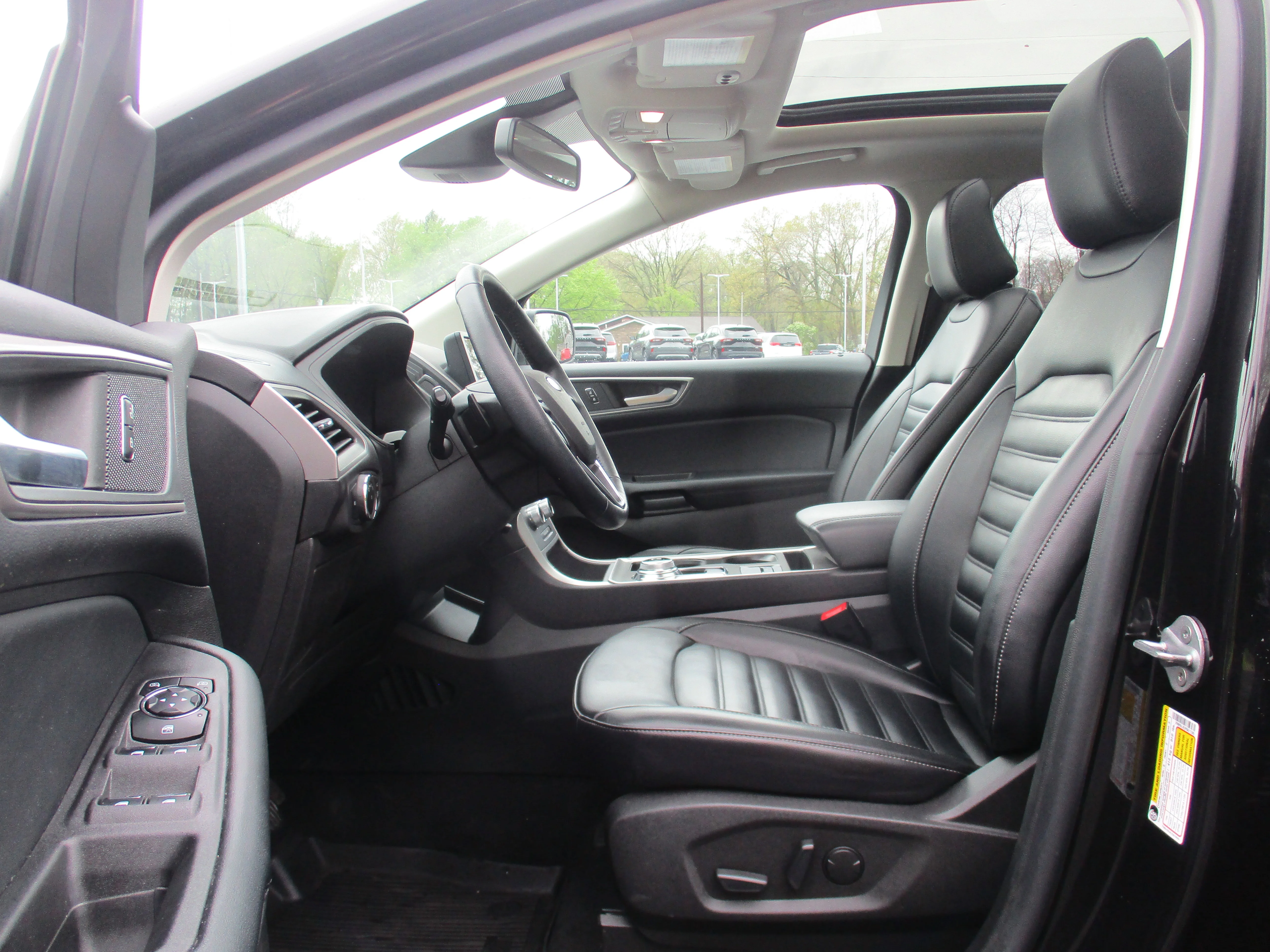 Used 2023 Agate Black Metallic Ford SEL image 25