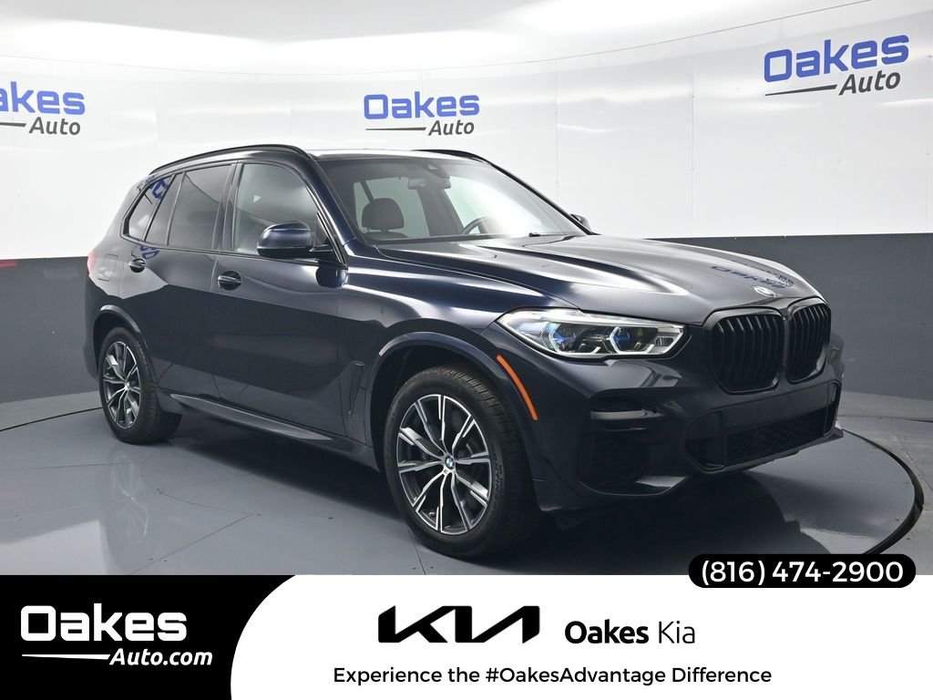 Used 2022 Carbon Black Metallic BMW M50i image 1