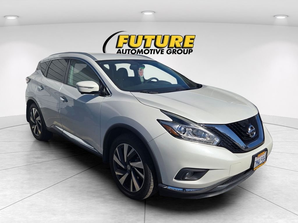 Used 2015 White Nissan Platinum image 1
