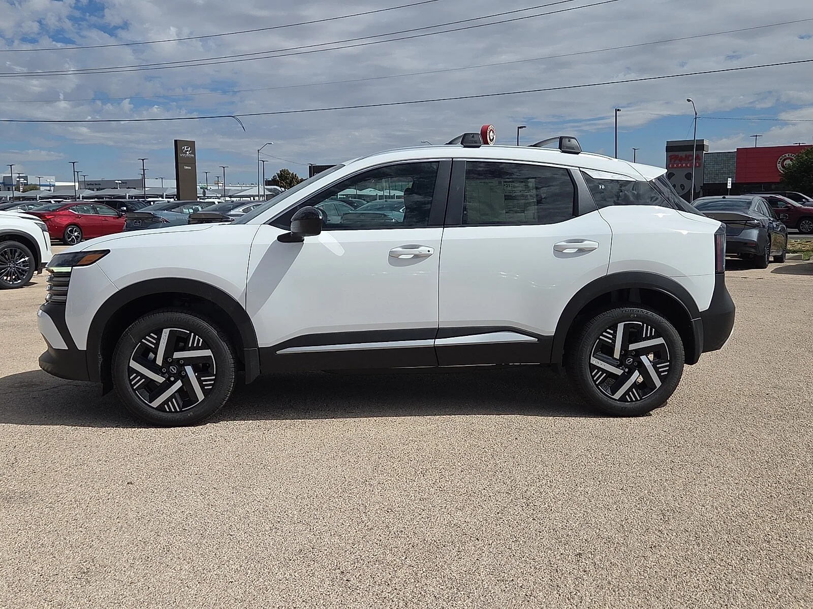 New 2027 QM1 Fresh Powd Nissan SV Front-Wheel Drive image 2