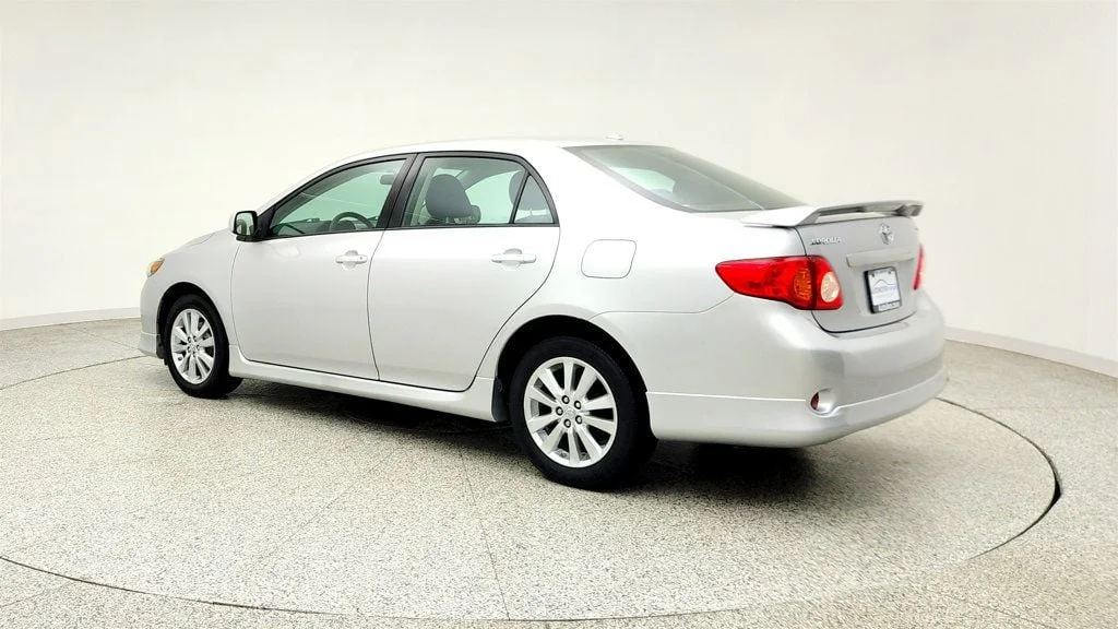 Used 2010 Classic Silver Metallic Toyota 4dr Sedan Manual S w/ Power Moonroof & 16