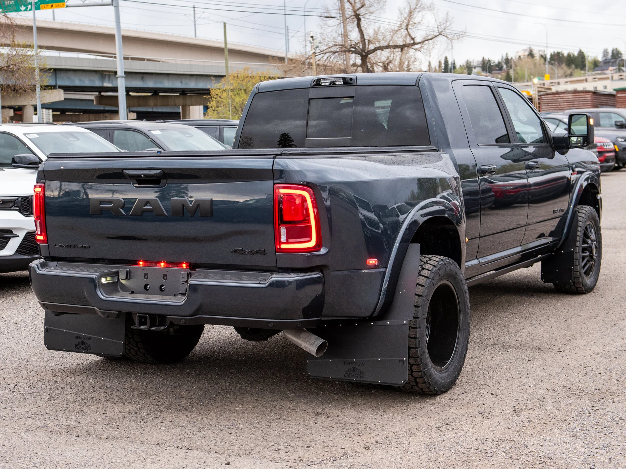 Used 2026 Blue RAM Limited* Mega Cab, 20 Inch Mayhem Wheels, Trigger Industries Mudflaps image 10