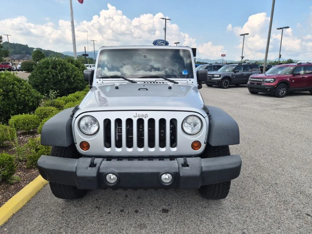 Used 2012 Bright Silver Metallic Jeep Sport image 3
