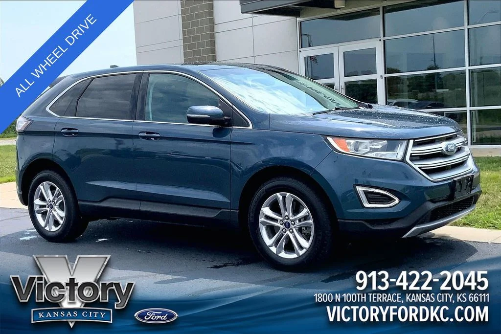 Used 2016 Blue Ford SEL image 1