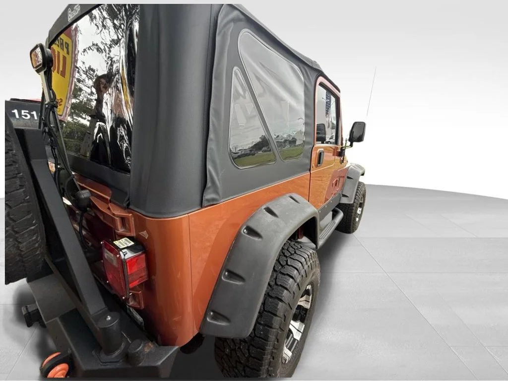 Used 2000 Orange Jeep Sport image 5