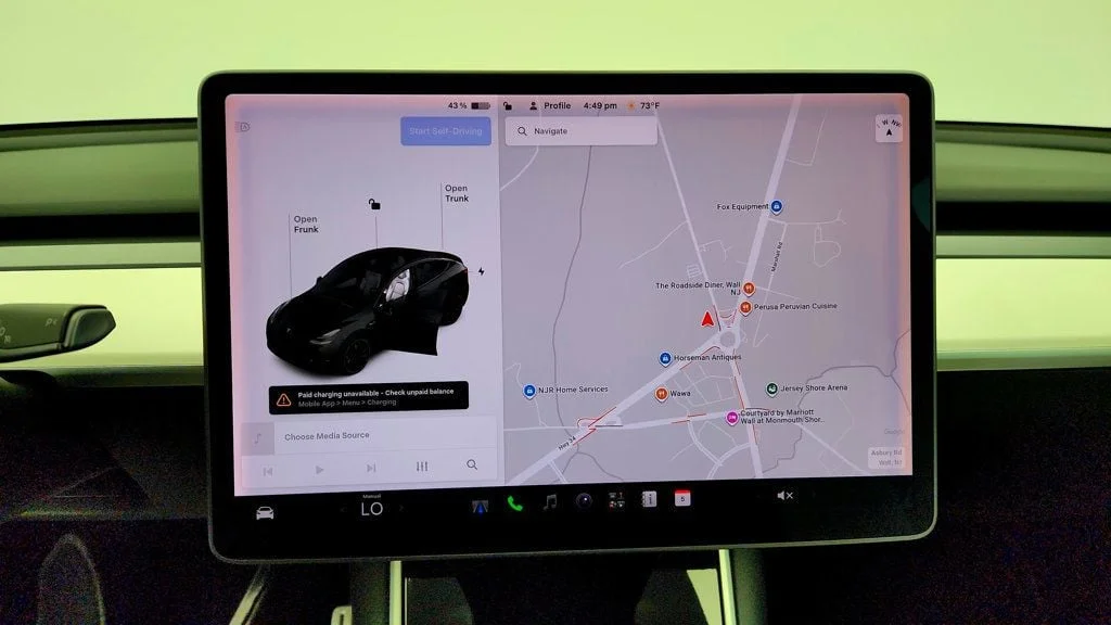 Used 2021 Solid Black Tesla Performance AWD w/ White & Black Premium Interior image 22
