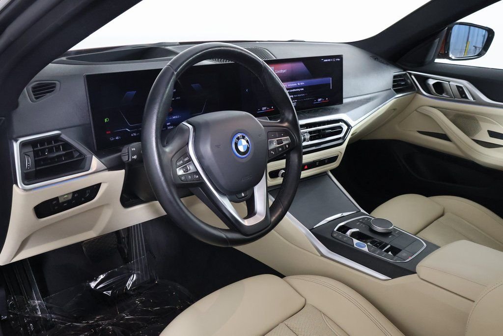 Certified Used 2023 Sunset Orange Metallic BMW eDrive35 image 7