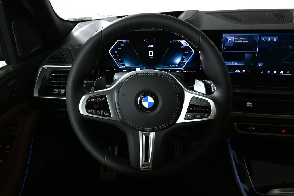 New 2027 Black Sapphire Metallic BMW M60i image 18