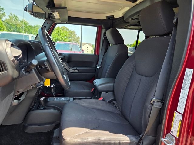 Used 2013 Red Jeep Unlimited Sport image 9