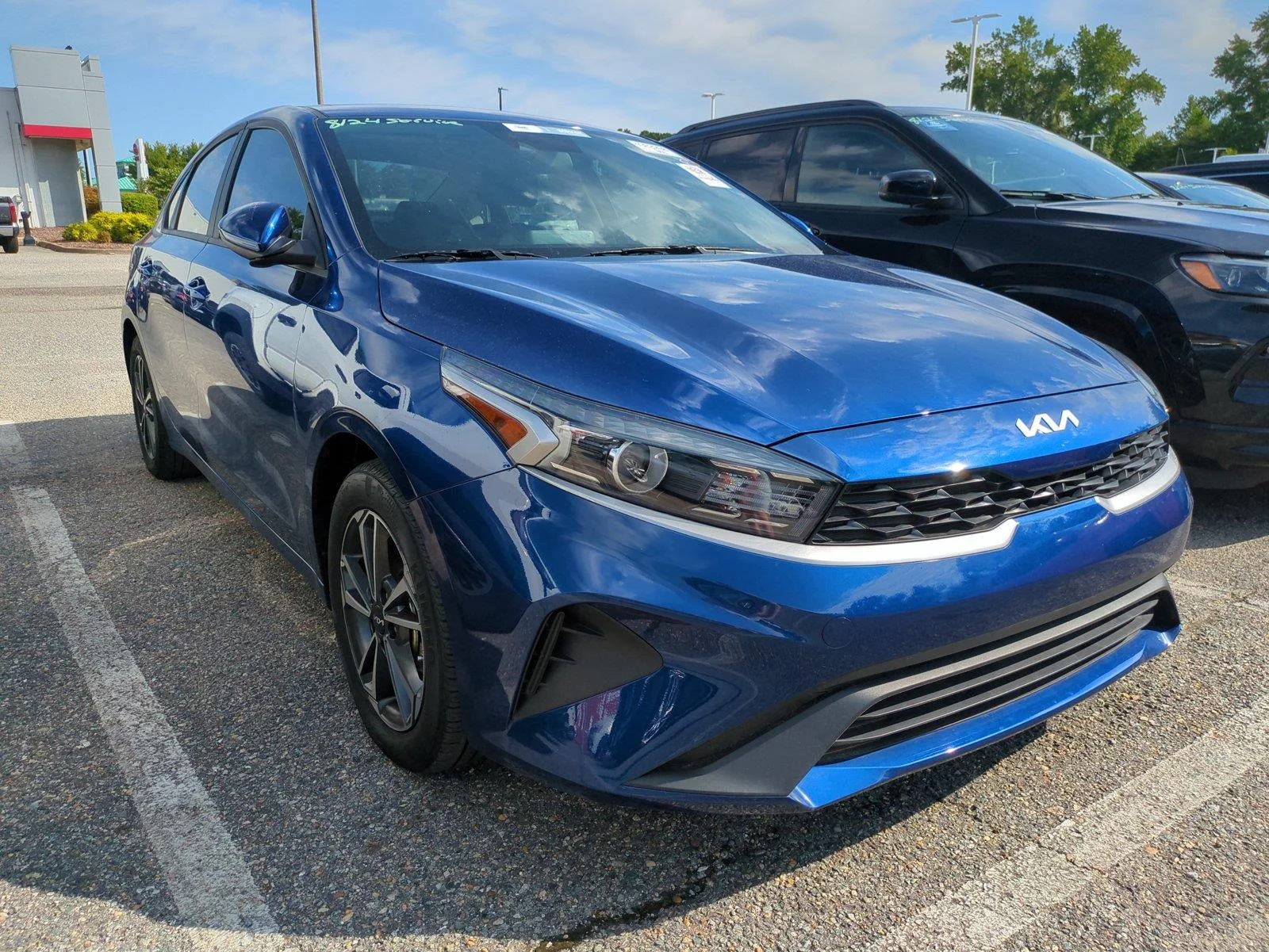 Used 2024 Deep Sea Blue Kia LXS image 2
