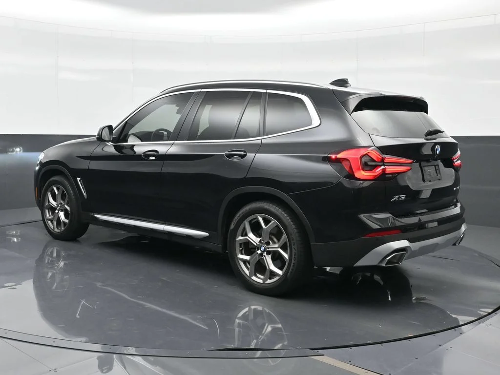 Certified Used 2024 Black Sapphire Metallic BMW sDrive30i image 2