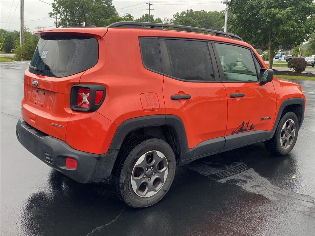 Used 2018 Omaha Orange Jeep Sport image 10