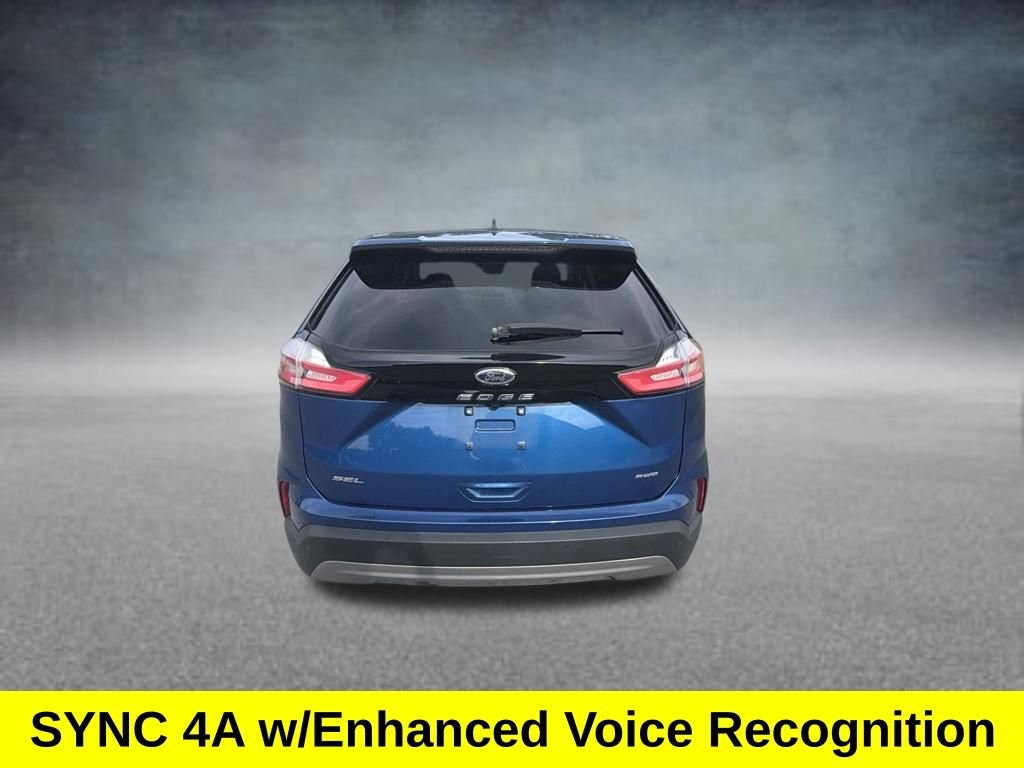 Certified Used 2024 Blue Metallic Ford SEL image 4