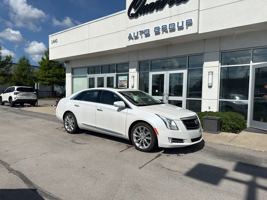Used 2016 CRYSTAL WHITE TRICOAT Cadillac Luxury Collection image 1