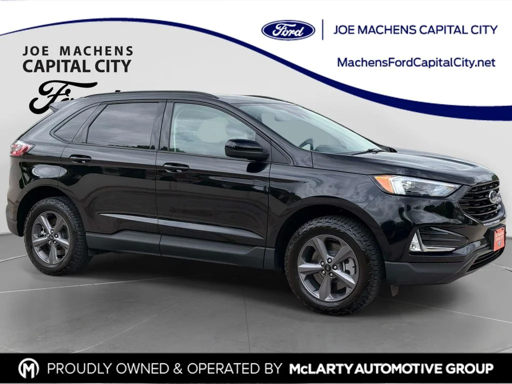 Used 2024 Agate Black Metallic Ford SEL image 1