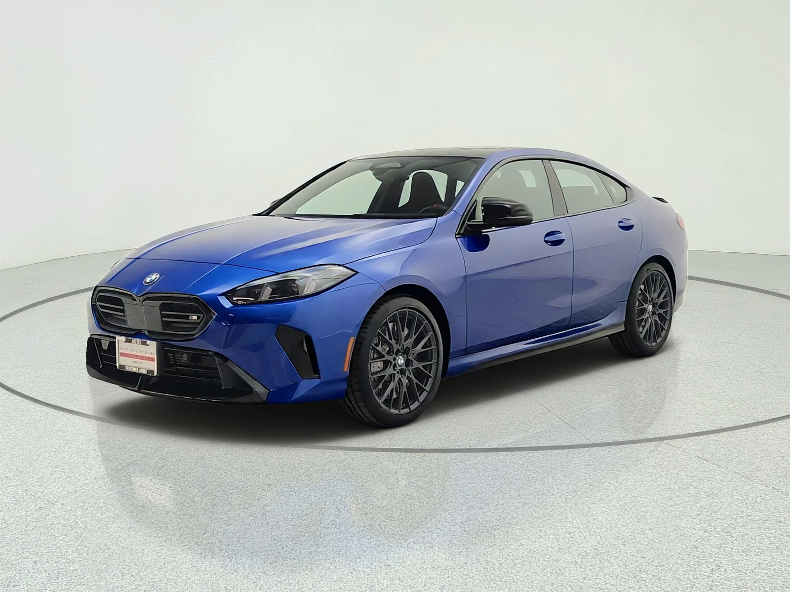 Used 2025 Portimao Blue Metallic BMW M235 xDrive image 1