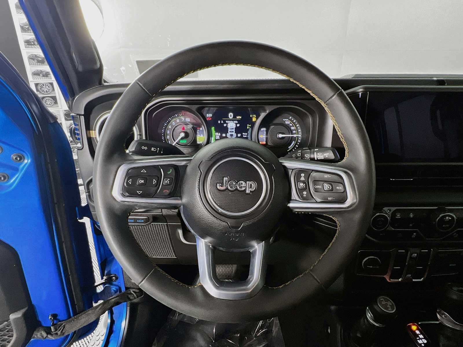 Used 2024 Hydro Blue Pearlcoat Jeep Sahara image 11