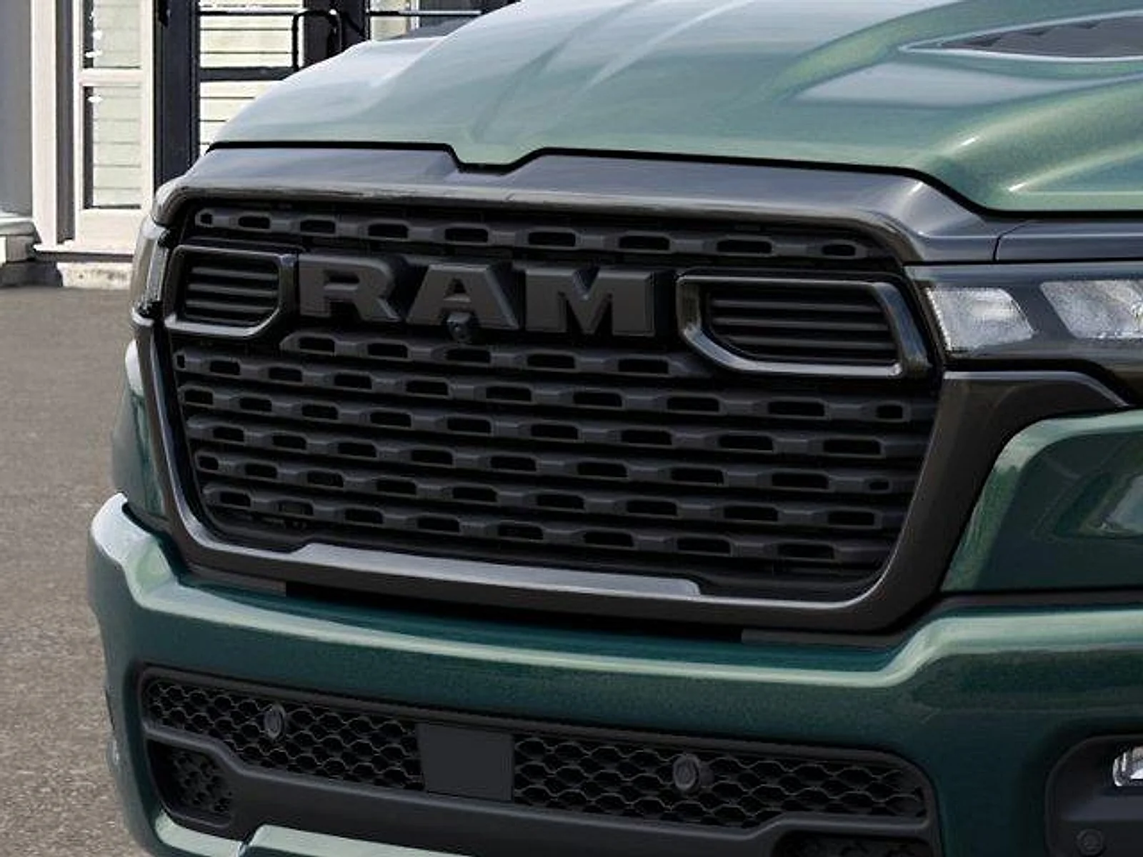 New 2026 Serrano Green Metallic RAM Express Quad Cab 4x4 6