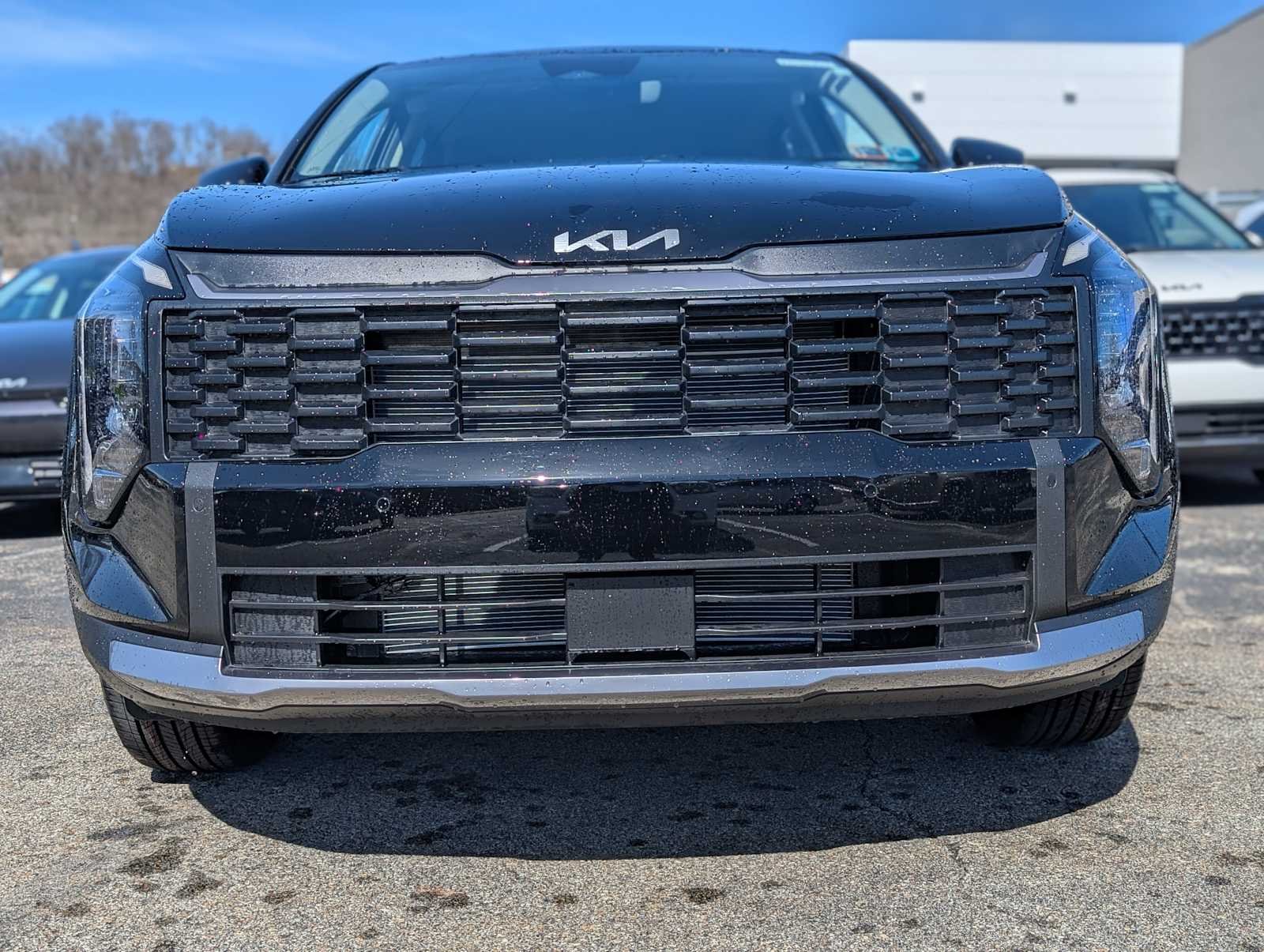 New 2026 Ebony Black Kia LX image 2