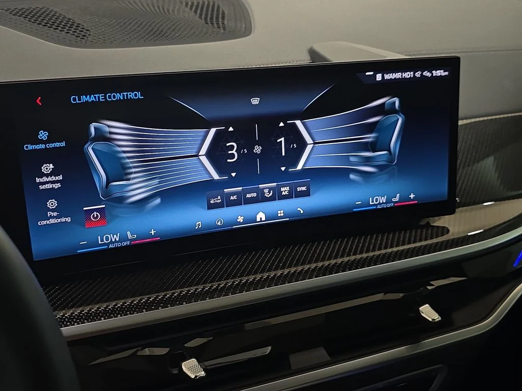 Used 2025 Black Sapphire Metallic BMW M60i image 25