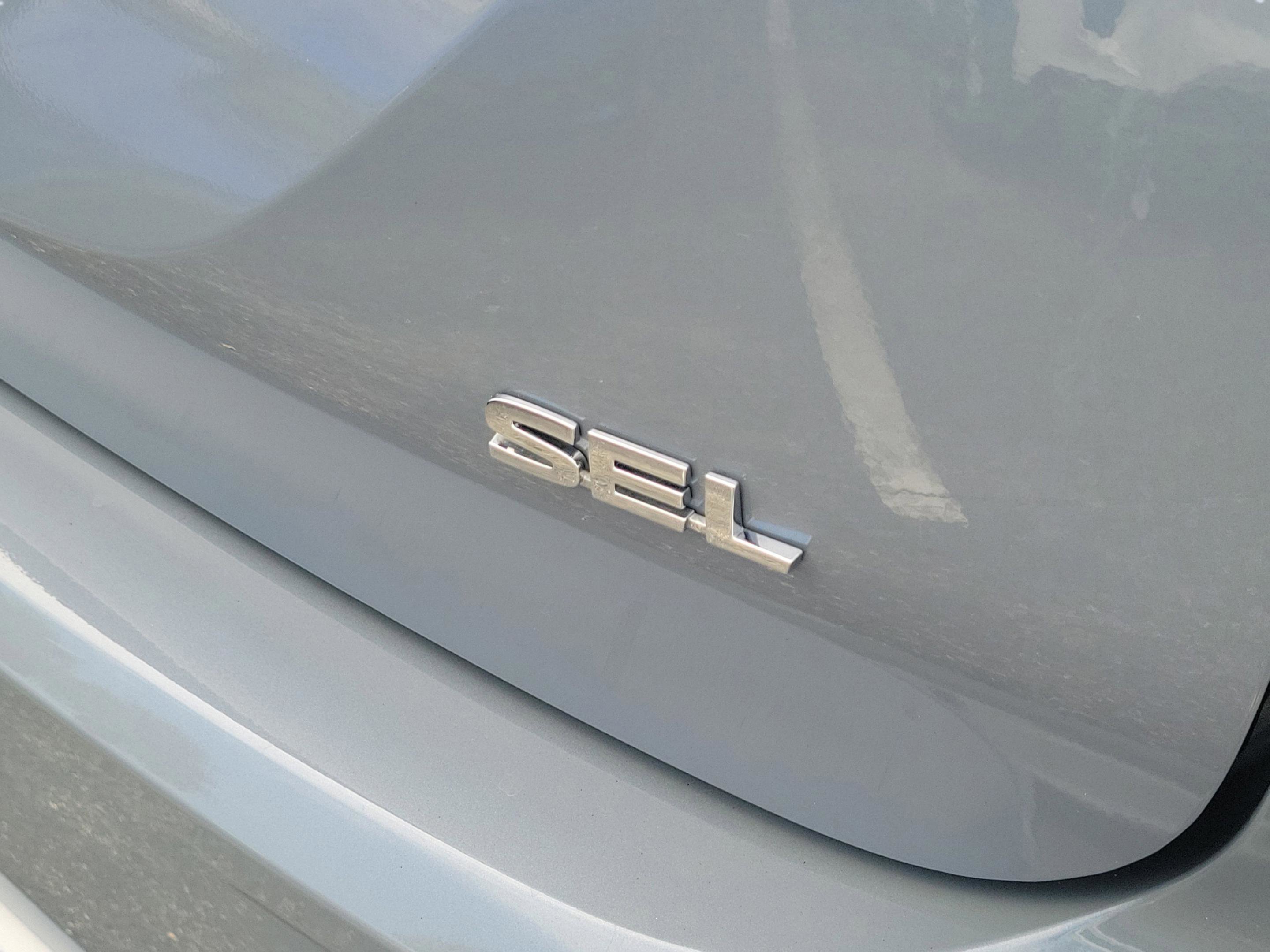 Used 2025 Moonstone Gray/Black Roof Mitsubishi SEL image 5