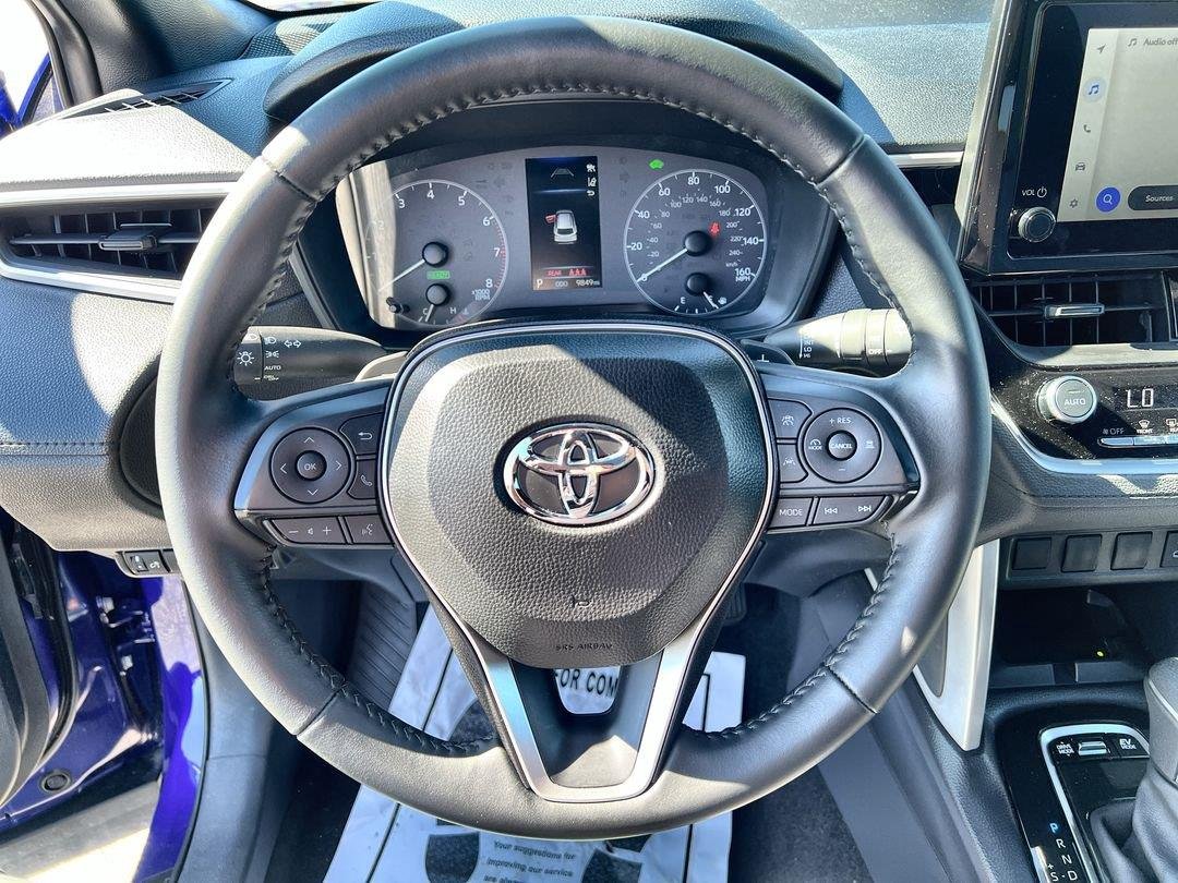 Used 2025 Blue Crush Metallic w/Jet Black Roof Toyota Hybrid SE image 17