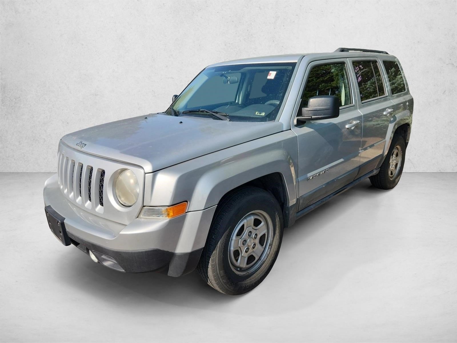 Used 2011 Bright Silver Metallic Jeep Sport image 1