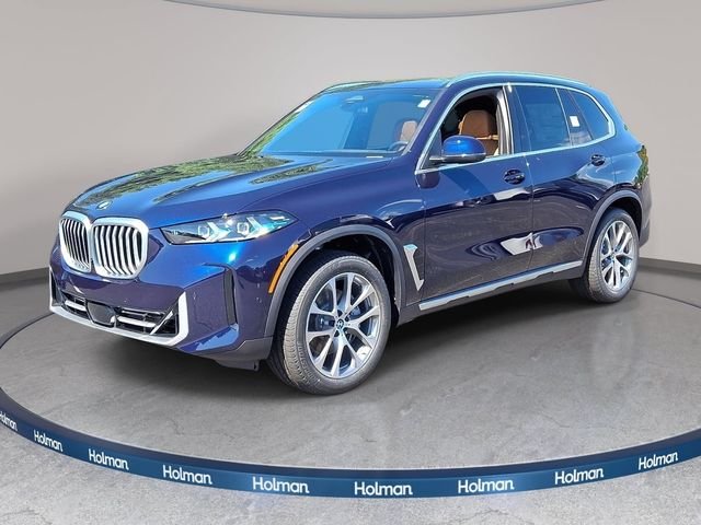 New 2026 Tanzanite Blue II Metallic BMW xDrive40i image 1