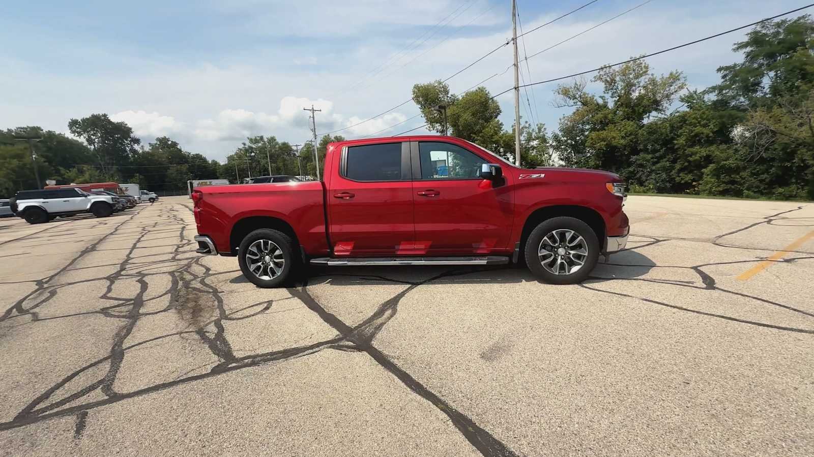 Certified Used 2023 RADIANT RED TINTCOAT Chevrolet LT image 9