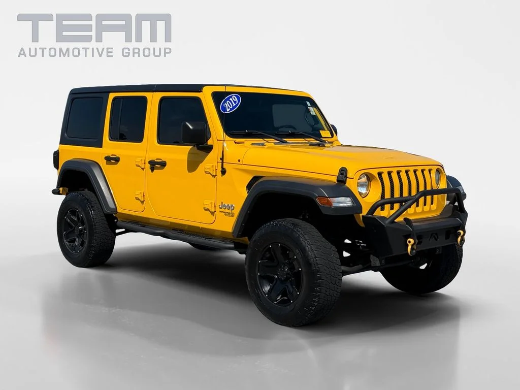 Used 2019 Yellow Jeep Unlimited Sport S image 1