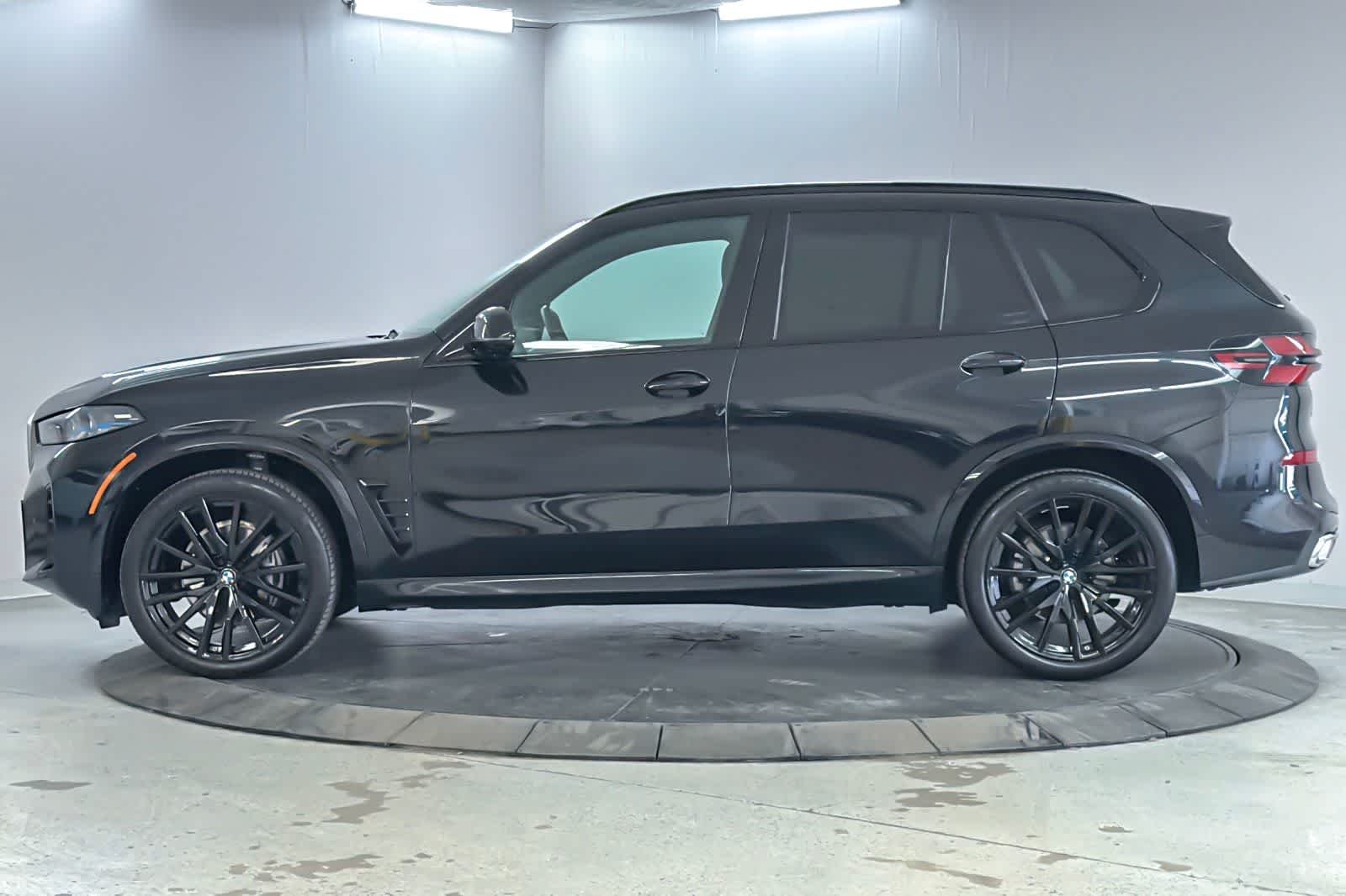 Certified Used 2024 Black Sapphire Metallic BMW xDrive40i image 5