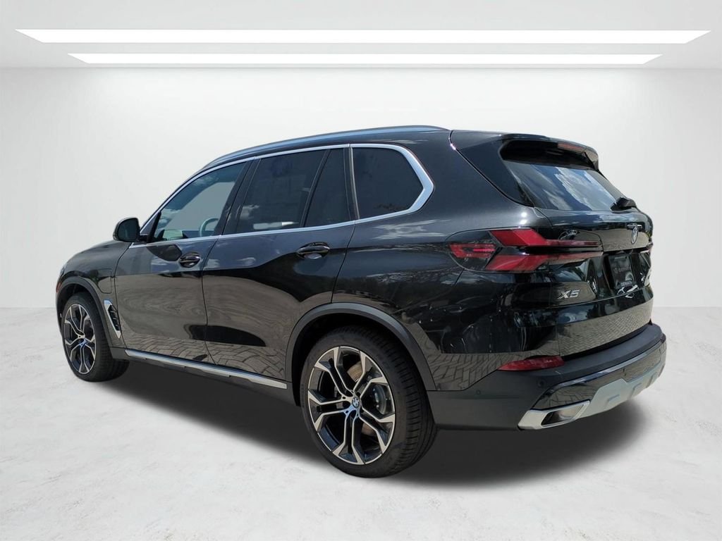 New 2026 Black Sapphire Metallic BMW xDrive50e image 6
