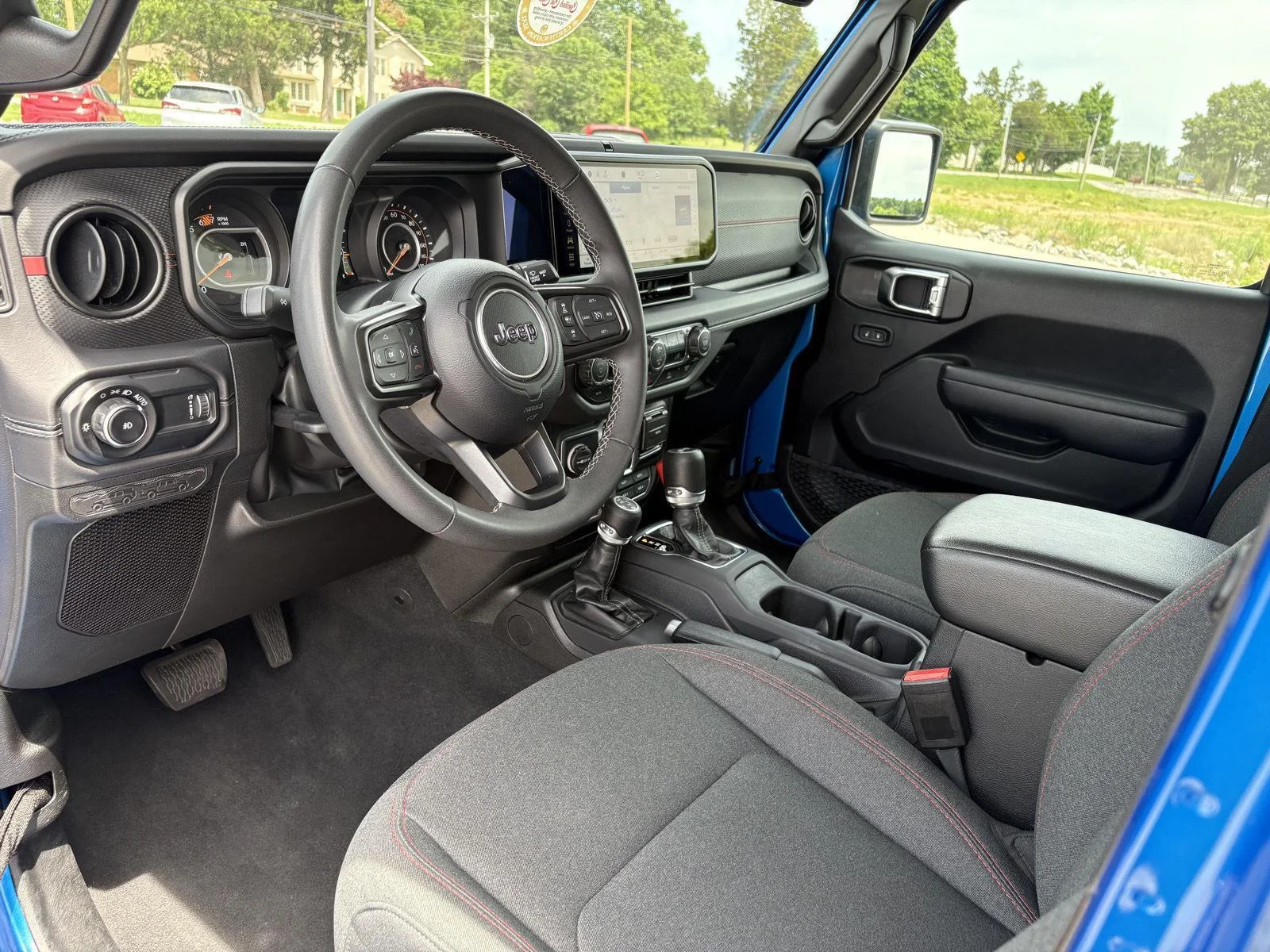 Used 2025 Hydro Blue Pearlcoat Jeep Rubicon image 9